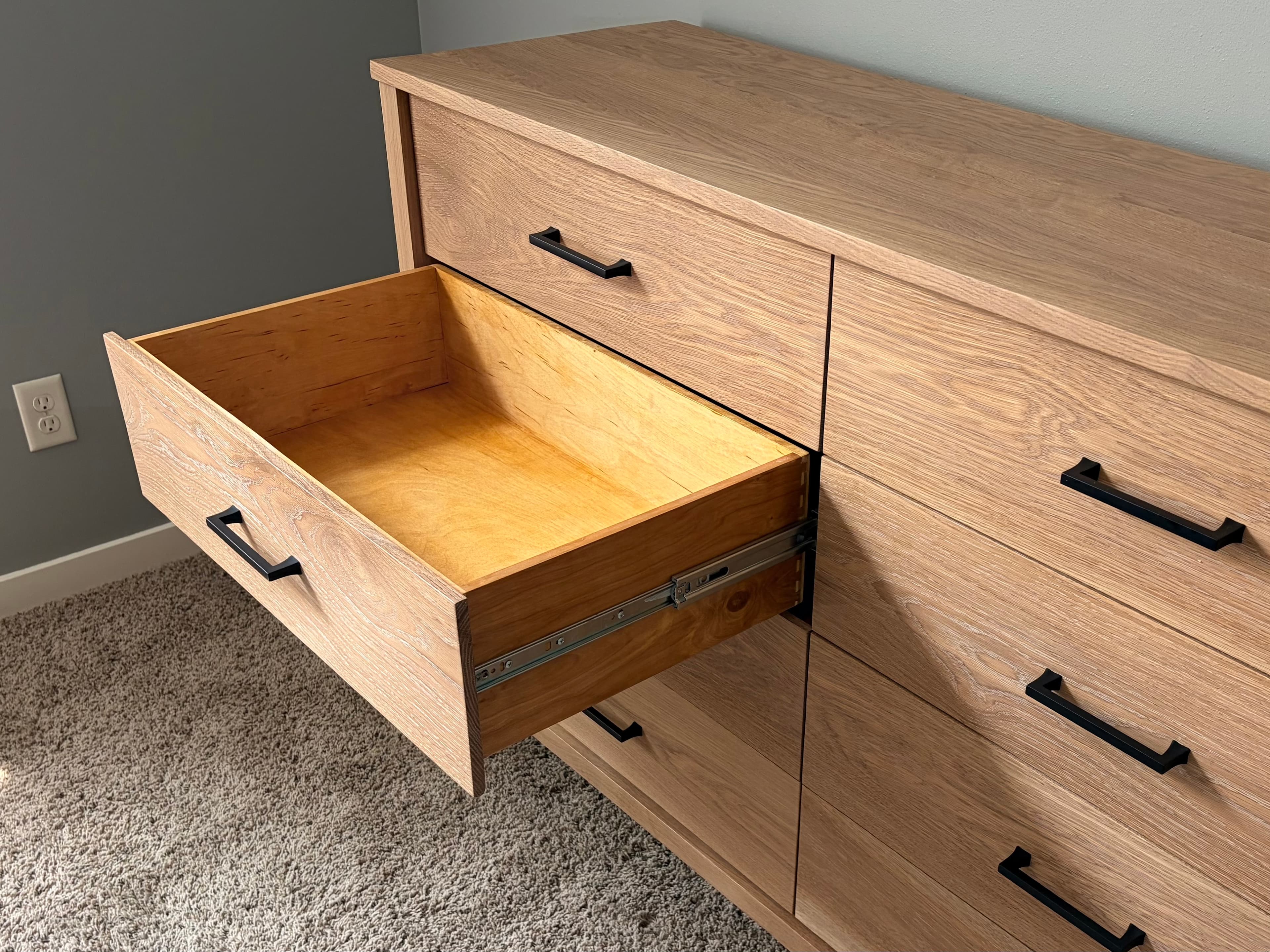 Drawer open, showing solid birch interior and ball-bearing slides